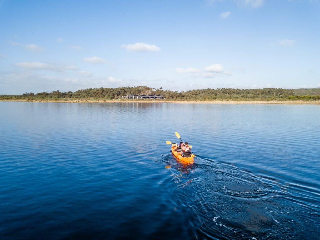 Guests kayaking at Perivoli Lagoon House